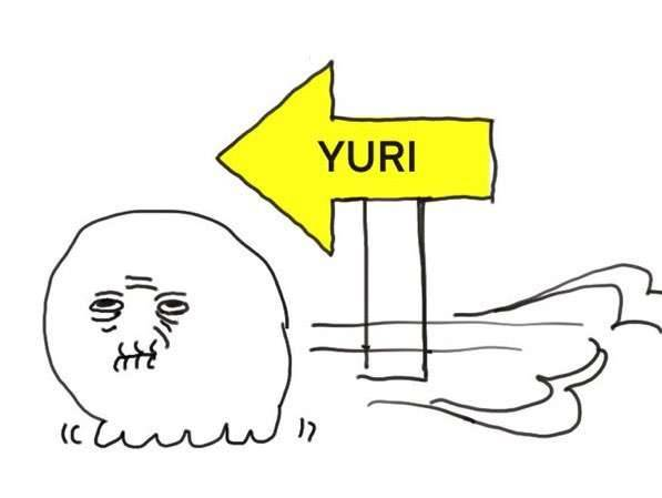 A crude drawing of a withered creature scuttling in the direction of a sign with 'YURI' and an arrow written on it.